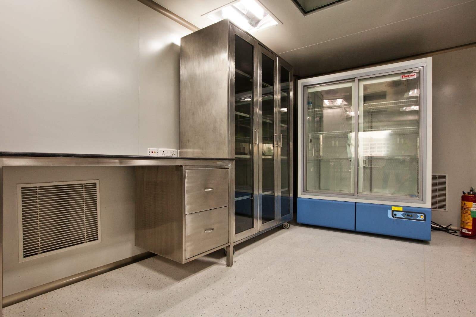 Stainless steel cleanroom furniture with Thermo Scientific cold storage