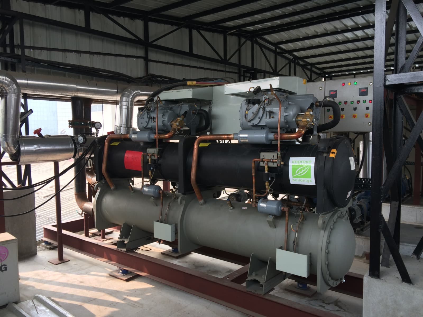 Twin water-cooled screw chillers with copper piping and control panel